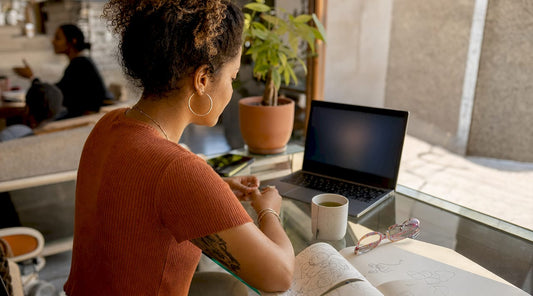 Woman in home office during telepsychiatry session